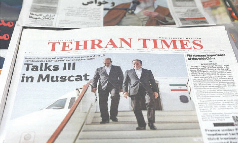 AN Iranian newspaper with a cover photo of Iran&rsquo;s Foreign Minister Abbas Araghchi is seen in Tehran on Saturday.&mdash;Reuters
