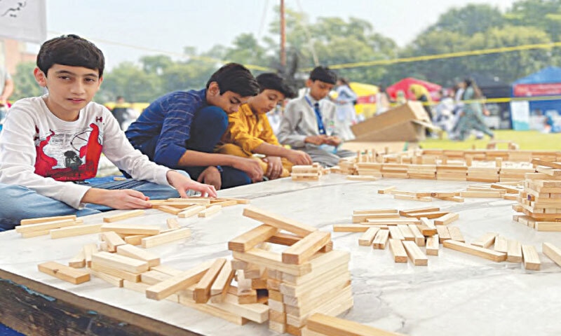 Students taking part in a maths challenge at the festival in 2023