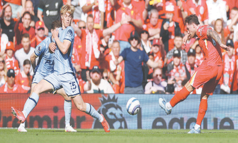 LIVERPOOL: Alexis Mac Allister of Liverpool shoots to score against Tottenham Hotspur during their Premier League match at Anfield on Sunday.
—Reuters LIVERPOOL: Alexis Mac Allister of Liverpool shoots to score against Tottenham Hotspur during their Premier League match at Anfield on Sunday.
—Reuters