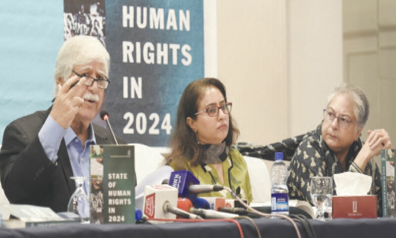HRCP Chairperson Asad Iqbal Butt speaks as co-chair Munizae Jahangir and Hina Jilani look on, at the launch of HRCP&rsquo;s annual flagship report &lsquo;State of Human Rights in 2024&rsquo;.
&mdash;Tanveer Shahzad / White Star