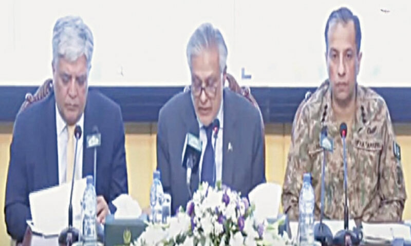 Foreign Minister Ishaq Dar addresses a presser, flanked by ISPR chief Lt Gen Ahmed Sharif Chaudhry and FO spokesperson Shafqat Ali Khan.—Screengrab