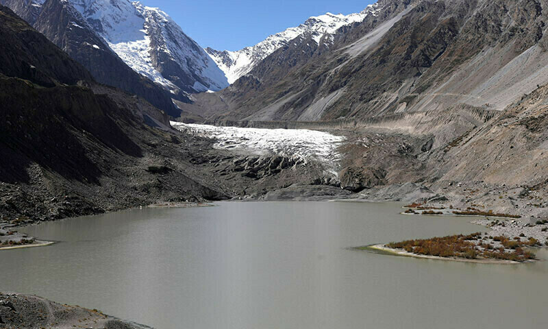 The Gamoo Bhr glacial lake pools in front of the Darkut glacier in Darkut village, Yasin valley, in the Gilgit-Baltistan region of Pakistan, October 11, 2023. — REUTERS