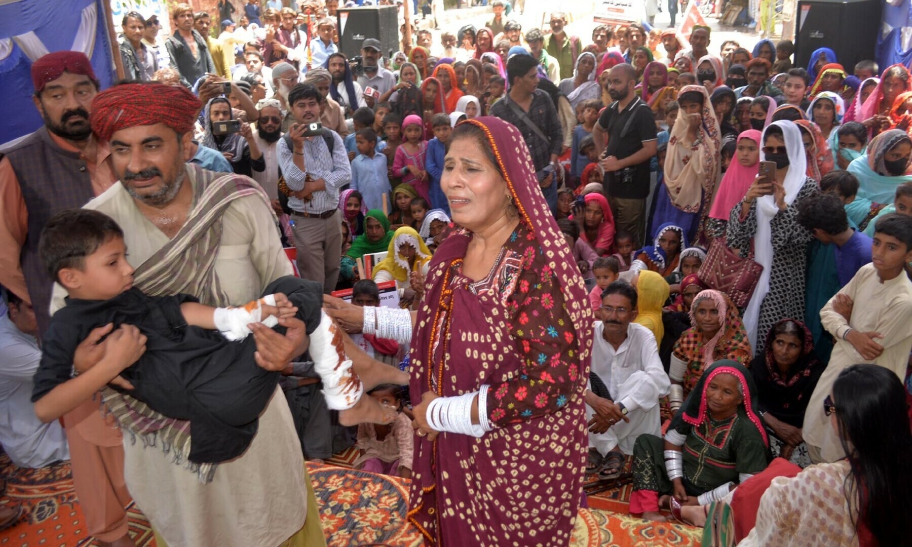 Artists present street theatre during Labour Day rally organised by SPARK outside HPC on May 1. — Umair Ali