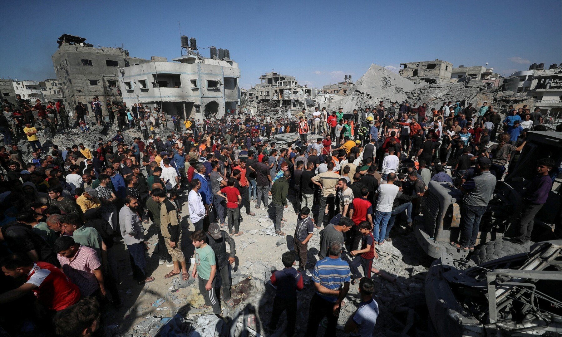  Palestinians search for casualties at the site of an Israeli strike on a house in Jabalia, in the northern Gaza Strip on May 2, 2025. &mdash; Reuters/Mahmoud Issa 