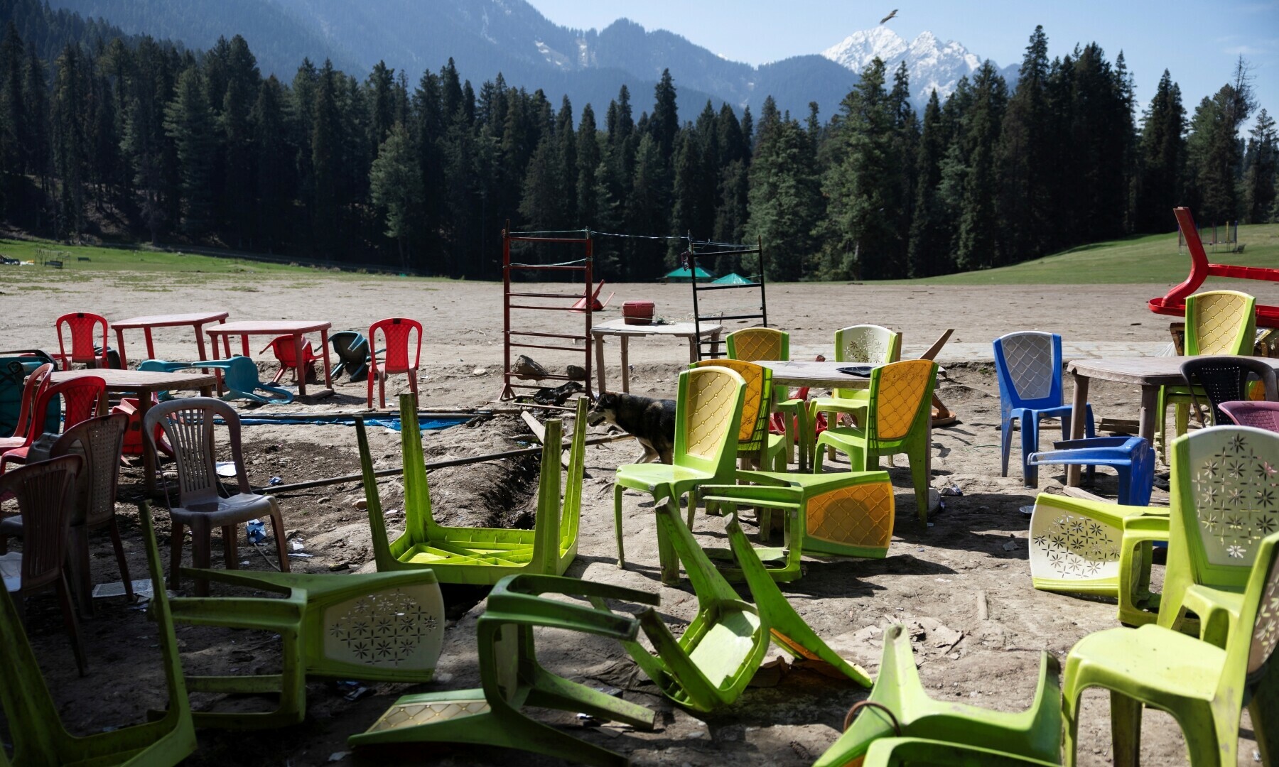 Chairs and tables are scattered at the site of an attack on tourists in Baisaran near Pahalgam in occupied Kashmir&rsquo;s Anantnag district, on April 24, 2025. &mdash; Reuters/Adnan Abidi