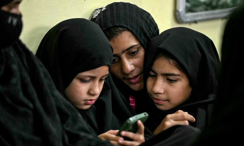 Residents living along the Line of Control (LoC) take shelter inside a degree college in Uri, about 100 kms from Srinagar after being evacuated by authorities on May 8 &mdash; AFP