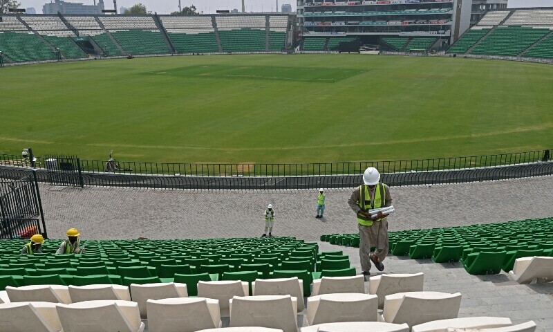 Labourers work on a stand at the Gaddafi Cricket Stadium, one of the venues for the Pakistan Super League (PSL), in Lahore on May 9.&mdash; AFP.