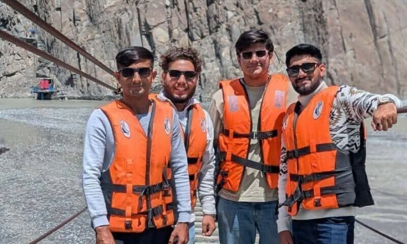 The four friends at Hussaini  bridge in Gojal Hunza days before the incident. &mdash; Police