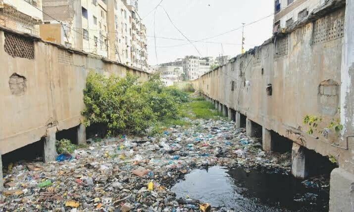 A drain in the Jubilee area is clogged with all kinds of solid waste.—Fahim Siddiqi / White Star/File