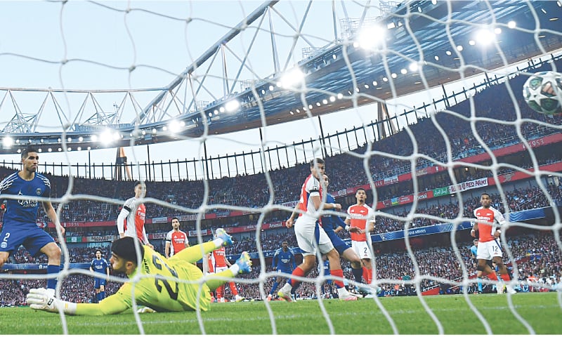 LONDON: Paris St Germain&rsquo;s Ousmane Dembele (sixth L) scores past Arsenal goalkeeper David Raya during their UEFA Champions League semi-final first leg at the Emirates Stadium on Tuesday.&mdash;Reuters
