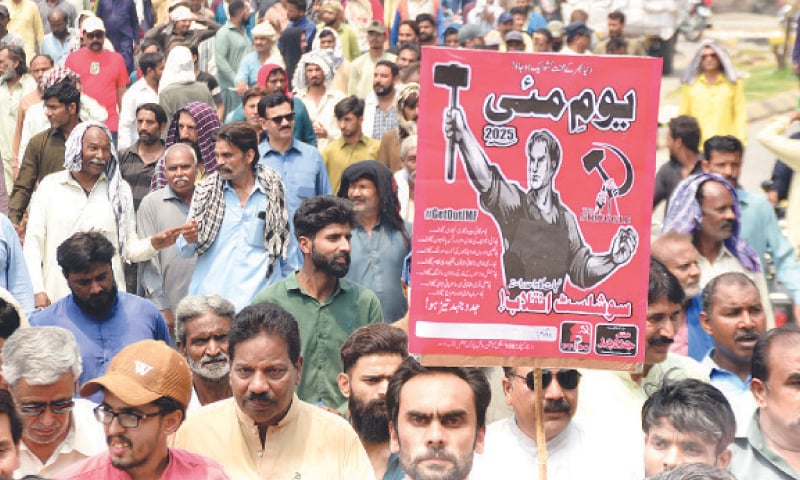 Employees of Rawalpindi Tehsil Municipal Administration stage a rally on Labour Day on Liaquat Road on Thursday. — White Star Employees of Rawalpindi Tehsil Municipal Administration stage a rally on Labour Day on Liaquat Road on Thursday. — White Star