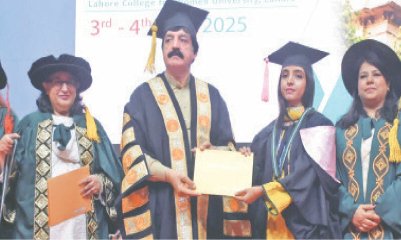 Governor Sardar Saleem Haider Khan awards a degree to a graduate at the Lahore College for Women University convocation. &mdash; Online