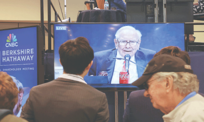 People watch Warren Buffett&rsquo;s address on a screen at the Berkshire Hathaway&rsquo;s annual shareholders&rsquo; meeting in Omaha, Nebraska, on Saturday.&mdash;Reuters