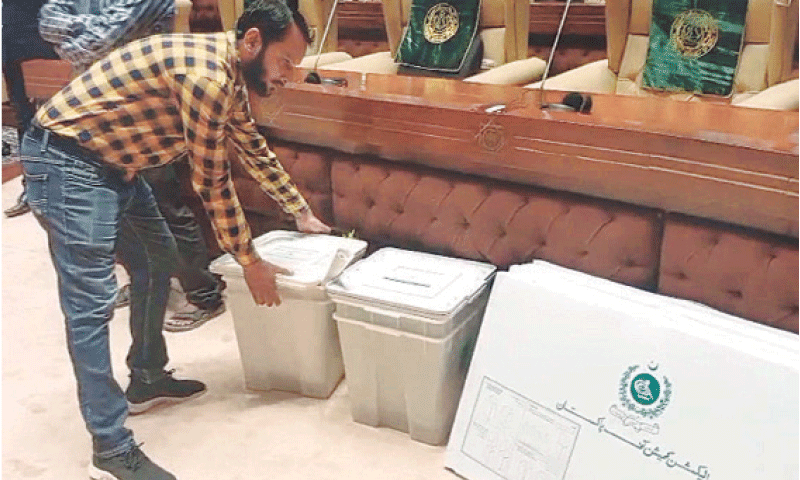 An election official places ballot boxes and other polling related material in the Sindh Assembly.&mdash;PPI