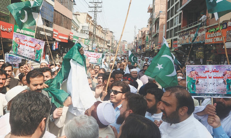 residents and officials of the district administration stage a rally at Kabuli Gate in Qissa Khwani Bazaar, Peshawar, to condemn Indian attack. &mdash; White Star