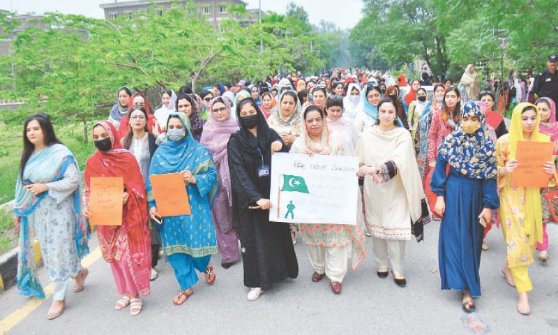 Faculty and students stage a rally at Shaheed Benazir Bhutto Women University to condemn Indian aggression and voice support for Pakistan armed forces. &mdash; White Star