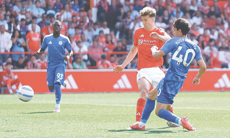 NOTTINGHAM: Leicester City&rsquo;s Facundo Buonanotte (R) shoots to score against Nottingham Forest during their Premier League match at The City Ground on Sunday.&mdash;Reuters