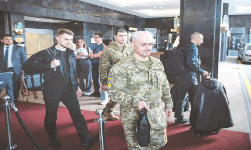 members of the Ukrainian delegation leave after a meeting with Russian representatives in Istanbul.—AFP