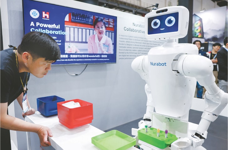 TAIPEI: A Nurabot, developed by Foxconn using Nvidia tech, on display at Computex on Wednesday.—Reuters