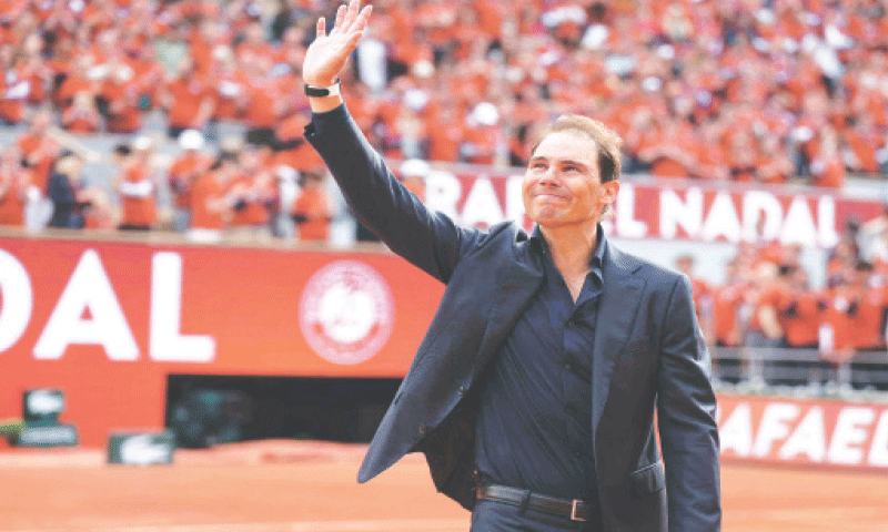 FORMER Spanish player Rafael Nadal waves to the crowd during a ceremony honouring his career during the French Open on Court 
Philippe-Chatrier at the Roland-Garros Complex on Sunday.&mdash;AFP
