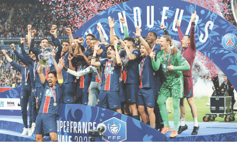 PARIS St-Germain&rsquo;s captain Marquinhos lifts the Coupe de France trophy as he celebrates with team-mates after defeating Reims in the final at Stade de France.&mdash;Reuters