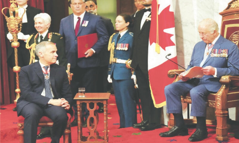 Ottawa: Canada&rsquo;s Prime Minister Mark Carney looks on as Britain&rsquo;s King Charles delivers the speech.&mdash;Reuters