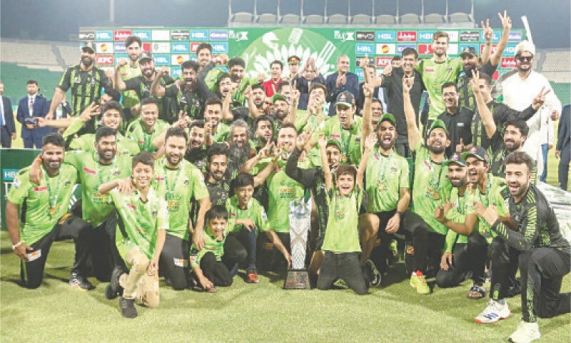 LAHORE Qalandars’ captain Shaheen Shah Afridi with other players and members after the victory ceremony at the end of the PSL final cricket match against Quetta Gladiators at the Gaddafi Stadium.