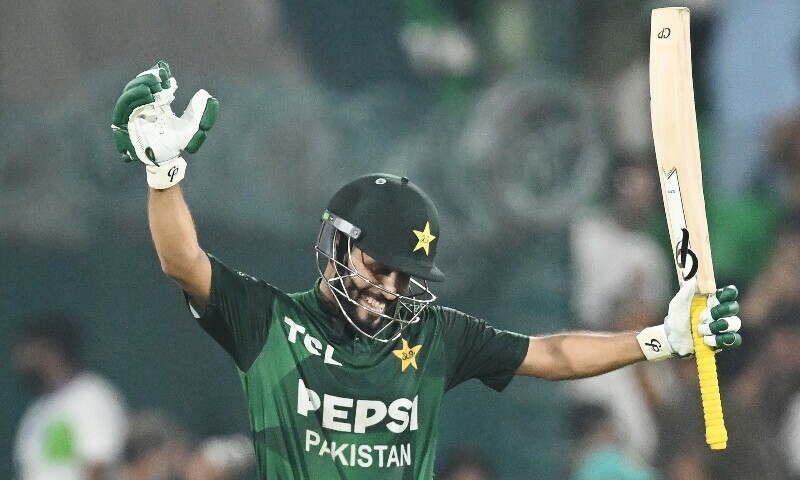 Pakistan’s Mohammad Haris celebrates after scoring a century (100 runs) during the third and final Twenty20 international cricket match between Pakistan and Bangladesh at the Gaddafi Cricket Stadium in Lahore on June 1. — AFP