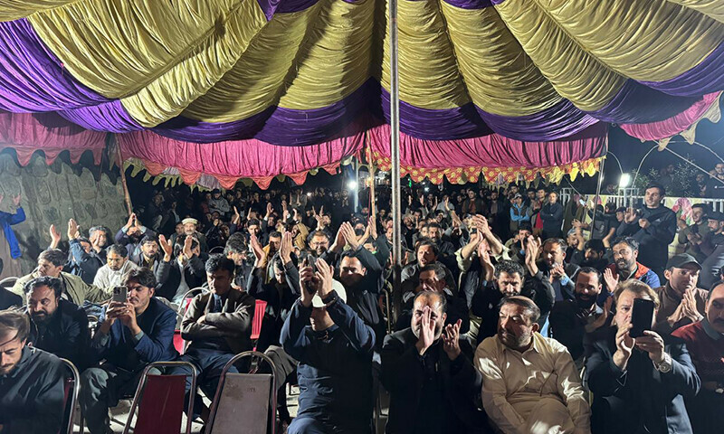 Protest sit-in at Karakoram Highway at Gulmat Nagar on Tuesday. &mdash; Jamil Nagri