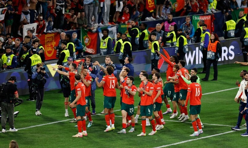 Team Portugal celebrates with the fans after winning the UEFA Nations League final football match between Portugal and Spain in Munich, southern Germany on June 8. &mdash; AFP