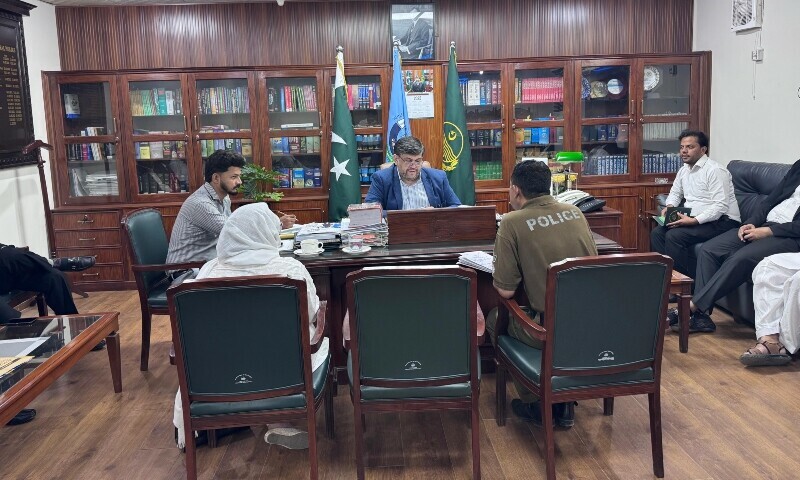 Punjab Prosecutor General Syed Farhad Ali Shah in a meeting with the investigating officer of the Hafizabad gang-rape case on Wednesday. — Photo courtesy Punjab prosecutor general office