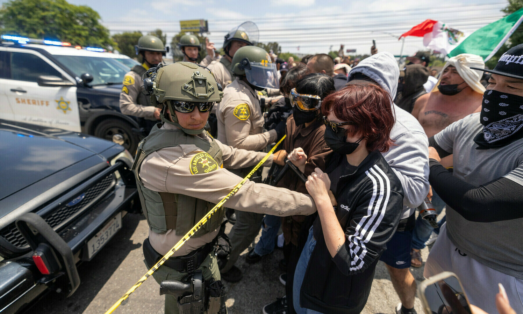 Curfew in LA as protests spread across US despite Trump threats