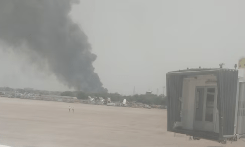 Smoke fills the air after the plane crashed near Ahmedabad airport. — photo via India Today