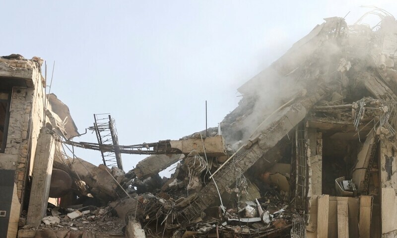 Smoke rises from a damaged building in the aftermath of Israeli strikes, in Tehran, Iran, June 13, 2025. — Reuters