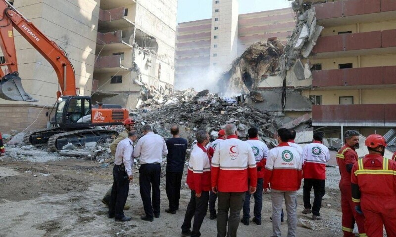 Rescuers work at the site of a damaged building, in the aftermath of Israeli strikes, in Tehran, Iran, June 13. — Reuters