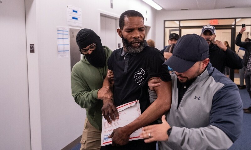A Jamaican man is detained by federal agents after his immigration court hearing at the Ted Weiss Federal Building on June 9 in New York City. — AFP