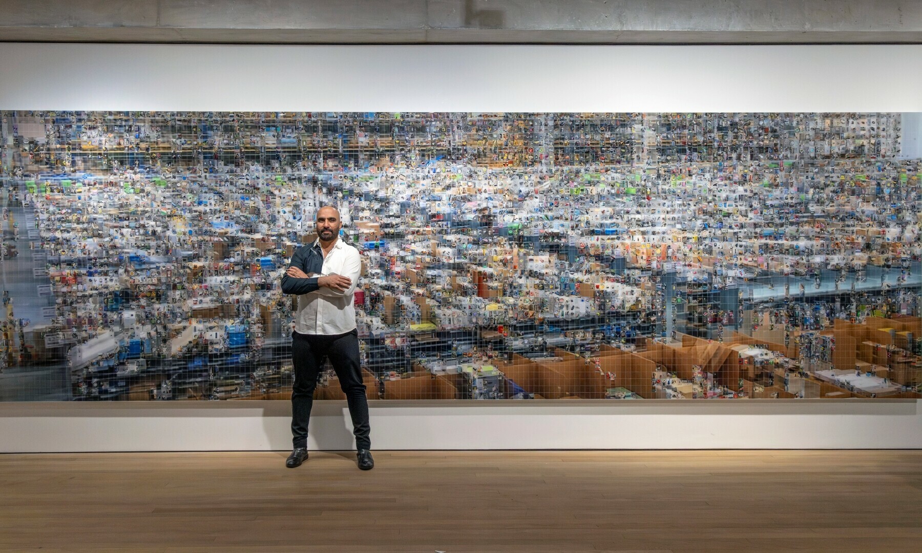 Rashid Rana with his work Amazon: The Centre Cannot Hold 1 | Photo by Vipul Sangoi Rashid Rana with his work Amazon: The Centre Cannot Hold 1 | Photo by Vipul Sangoi