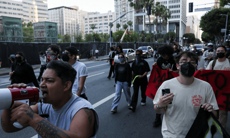 Demonstrators protest against federal immigration sweeps in Los Angeles, California, US on June 15, 2025. — Reuters/Leah Millis