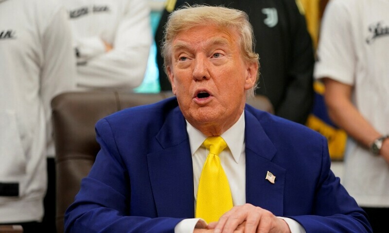 US President Donald Trump speaks with the media accompanied by players of the Juventus soccer team, in the Oval Office of the White House in Washington, DC, US, June 18. — Reuters