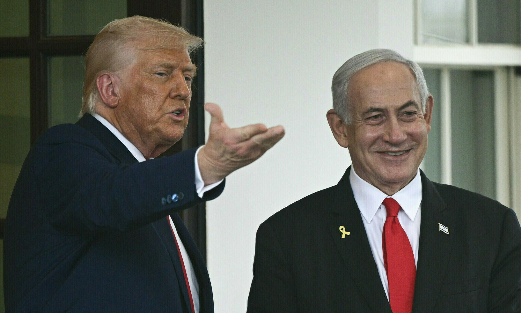 US President Donald Trump gestures as Israeli Prime Minister Benjamin Netanyahu departs the White House in Washington, DC, on April 7, 2025. — AFP/File