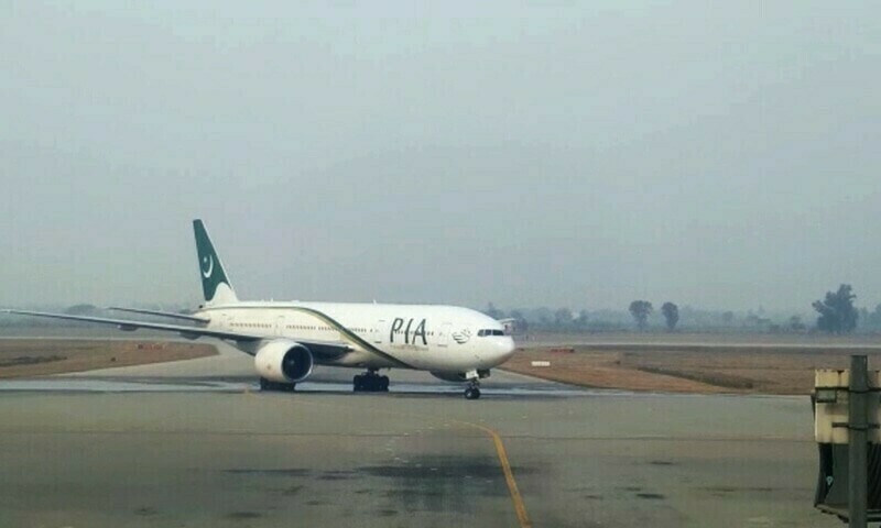 Pakistan International Airlines aircraft on the runway at Sialkot International Airport. — Ali Waqar/File