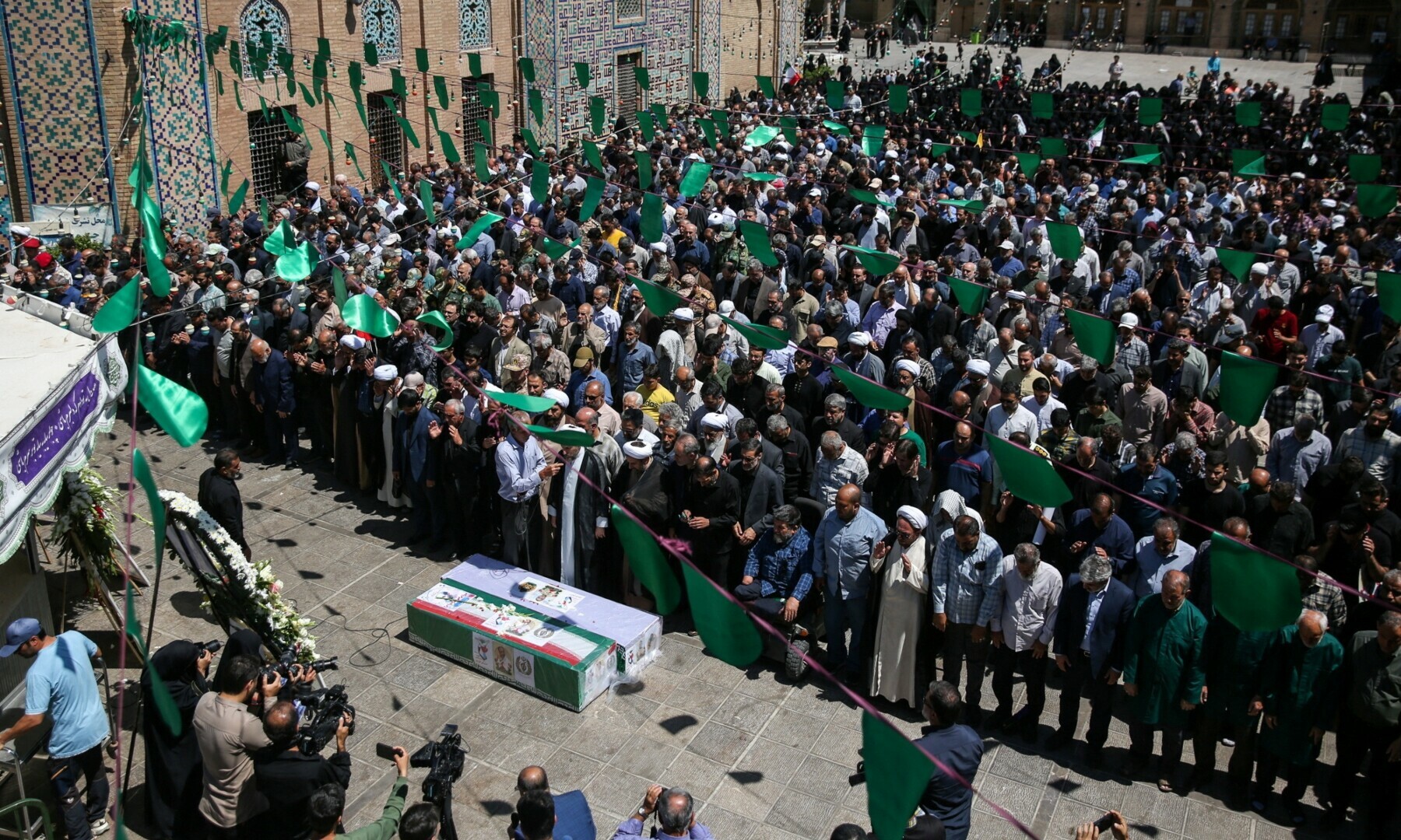  Mourners attend a funeral for those killed in Israeli strikes on Iran, in Qazvin, Iran on June 19, 2025. Tasnim/Wana via Reuters 