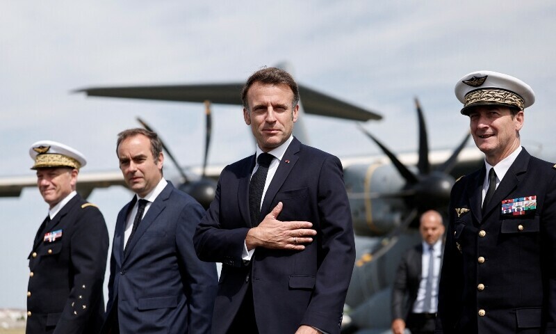 French President Emmanuel Macron, surrounded by French Minister of Armed Forces Sebastien Lecornu, and Chief of Staff of the French Air and Space Force (Armee de l&rsquo;air et de l&rsquo;espace) Jerome Bellanger, arrives for a visit at the 55th International Paris Airshow at Le Bourget Airport near Paris, France, June 20, 2025. &mdash; Reuters