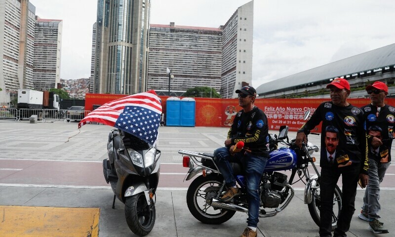  An upside-down US flag is seen at a march in support of Iran amid the ongoing conflict between Israel and Iran, in Caracas, Venezuela on June 19, 2025. &mdash; Reuters 