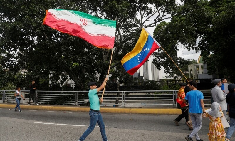  Government supporters wave the flags of Iran and Venezuela, as they participate in a march in support of Iran, amid the ongoing conflict between Israel and Iran, in Caracas, Venezuela June 19, 2025. &mdash; Reuters 