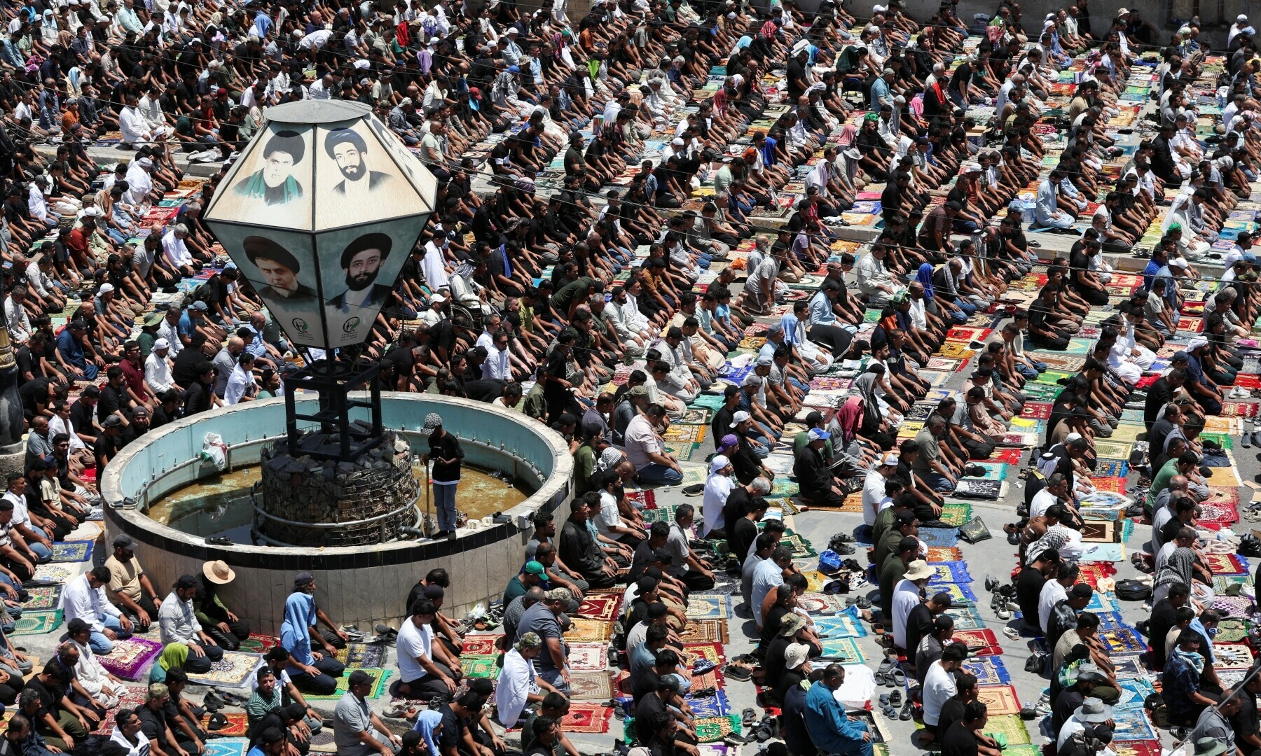  Supporters of Iraqi Shia cleric Moqtada al-Sadr gather to attend Friday prayers to protest against repeated violations of Iraqi airspace, amid the Iran-Israel conflict, in Baghdad, Iraq on June 20, 2025. &mdash; Reuters/Thaier Al-Sudani 