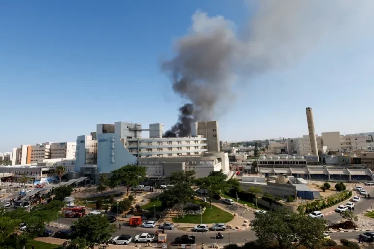 Smoke rises from Soroka Hospital following a missile strike from Iran in Beersheba, Israel, June 19. — Reuters
