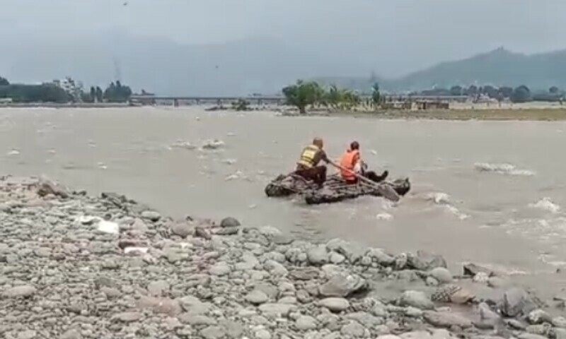 Rescue 1122 personnel operate in the Swat River on June 27. — Screengrab via Rescue 1122 Rescue 1122 personnel operate in the Swat River on June 27. — Screengrab via Rescue 1122