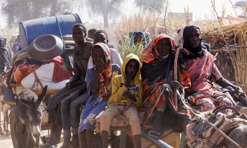Displaced people ride a an animal-drawn cart, following Rapid Support Forces (RSF) attacks on Zamzam displacement camp, in the town of Tawila, North Darfur, Sudan April 15. &mdash; Reuters
