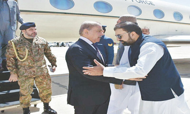 Balochistan Chief Minister Mir Sarfraz Bugti welcomes Prime Minister Shehbaz Sharif at the Quetta airport on Saturday.&mdash;PPI